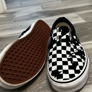 Vans Classic Slip-On Checkerboard Shoes.